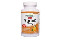 A bottle of Natures Aid Vitamin C 500mg chewable tablets, labeled with No Added Sugar and an image of oranges, contains 50 tablets for immune health.